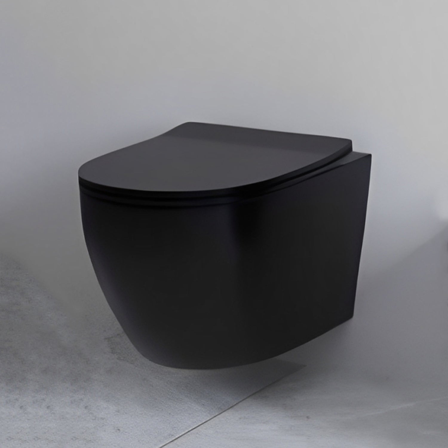 Vaso sospeso senza brida con Copriwater Soft Close BathCore serie Aria 52x37 cm - Nero Opaco